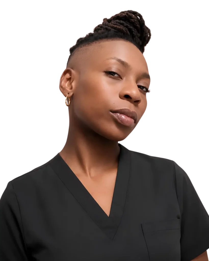 Person with styled hair and hoop earrings wearing a black V-neck shirt against a black background.